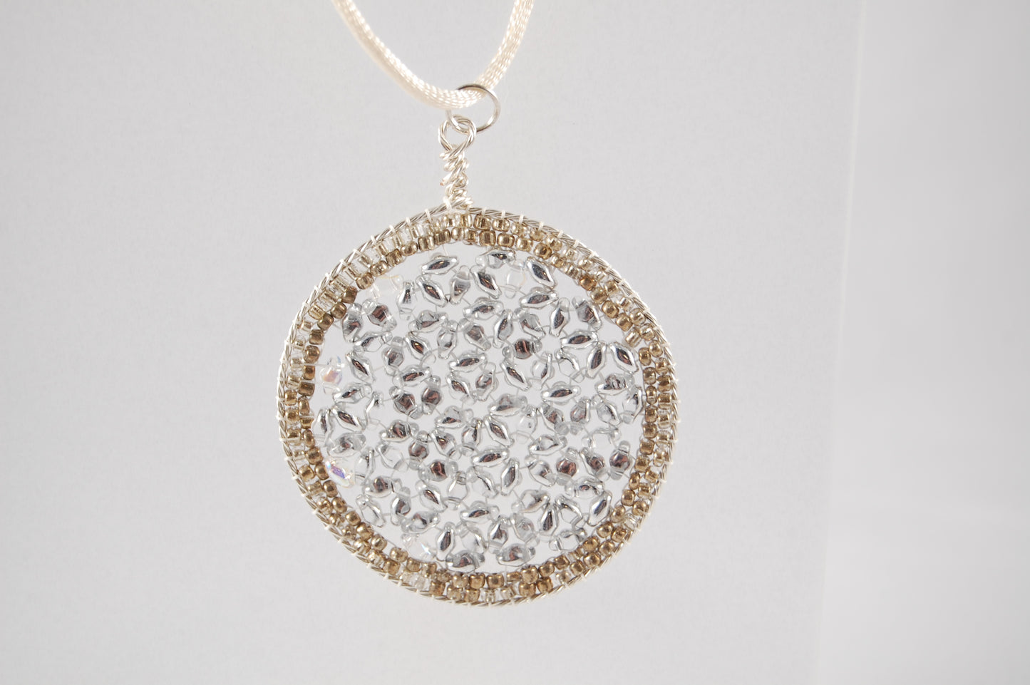 Crystal Flower of Life Sacred Geometry Pendant.